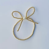 SK - Gold Bow Baby